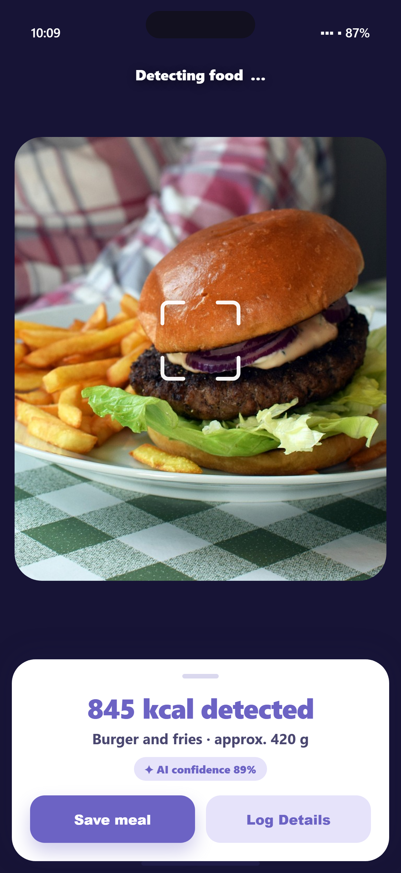 Calma screen: AI detects a burger and fries and shows 845 kcal